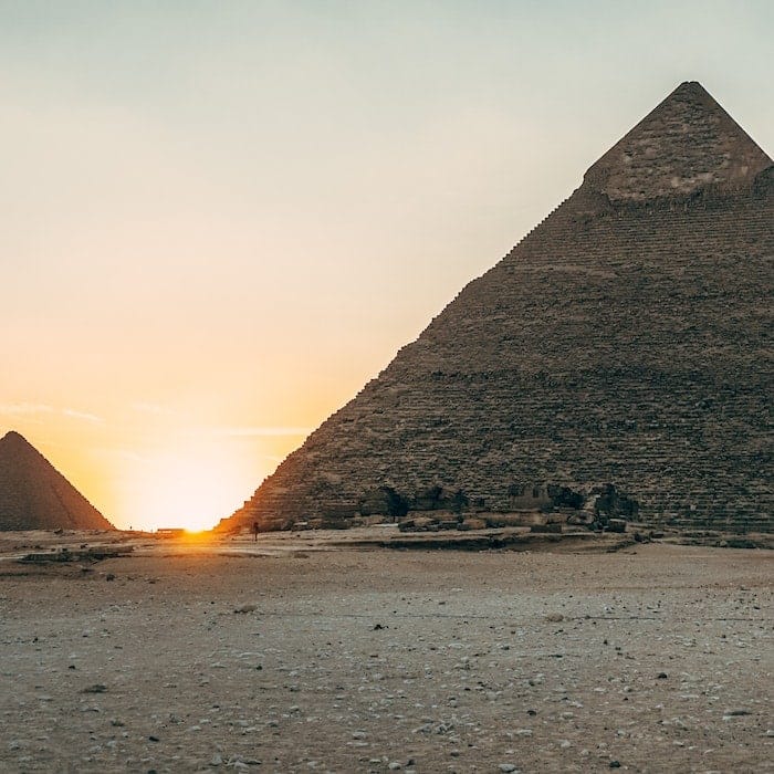 An image of the Pyramids of Giza during sunset