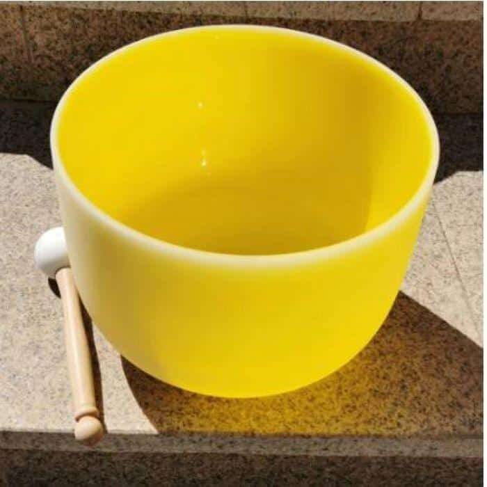 a yellow Tibetan singing bowl E note