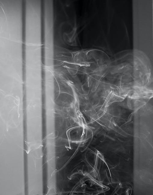 Cigarette smoke floating in dark room - bad habits