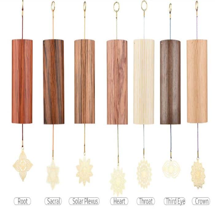 Seven lined-up bamboo chakra wind chimes with talisman and string 