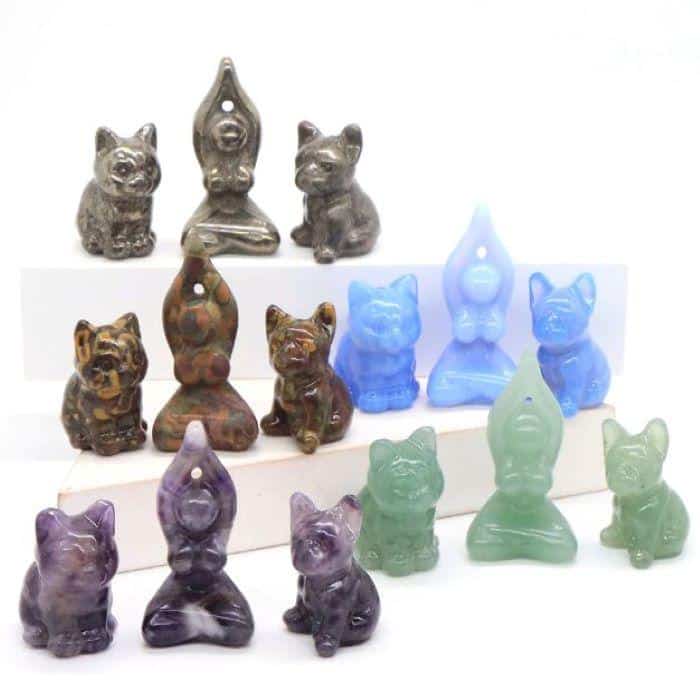 Five sets of goddess, dog, and cat. meditation figurines with varied colors