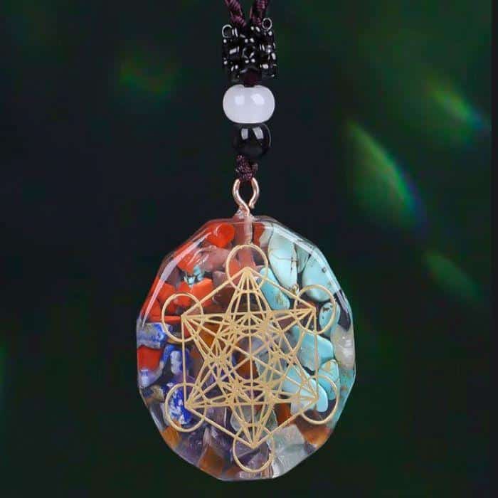 A meditation pendant containing the Flower of Life symbol