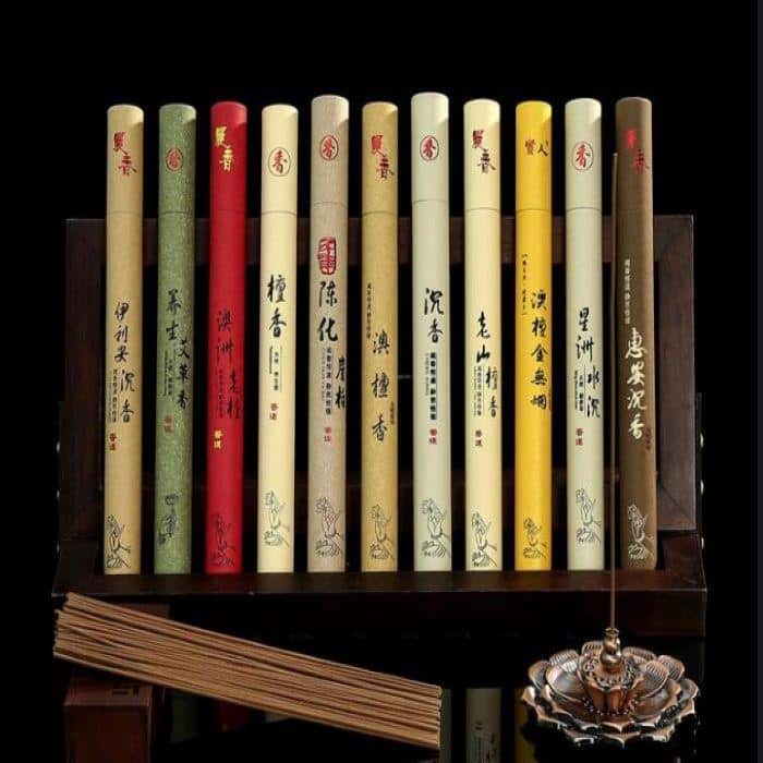 11 meditation incense sticks arranged on a wooden rack