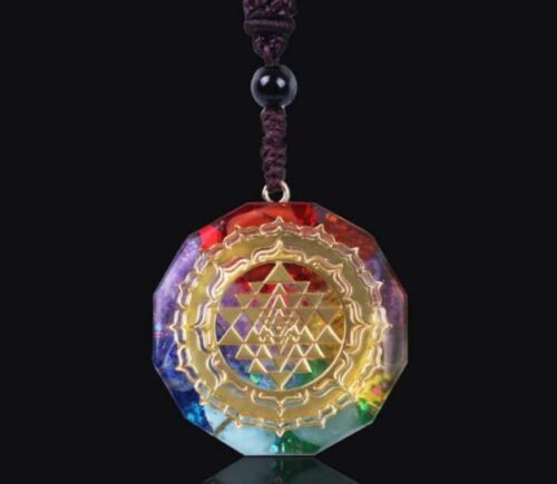 an image of Sacred Geometry Chakra Energy Meditation Necklace  with a black background